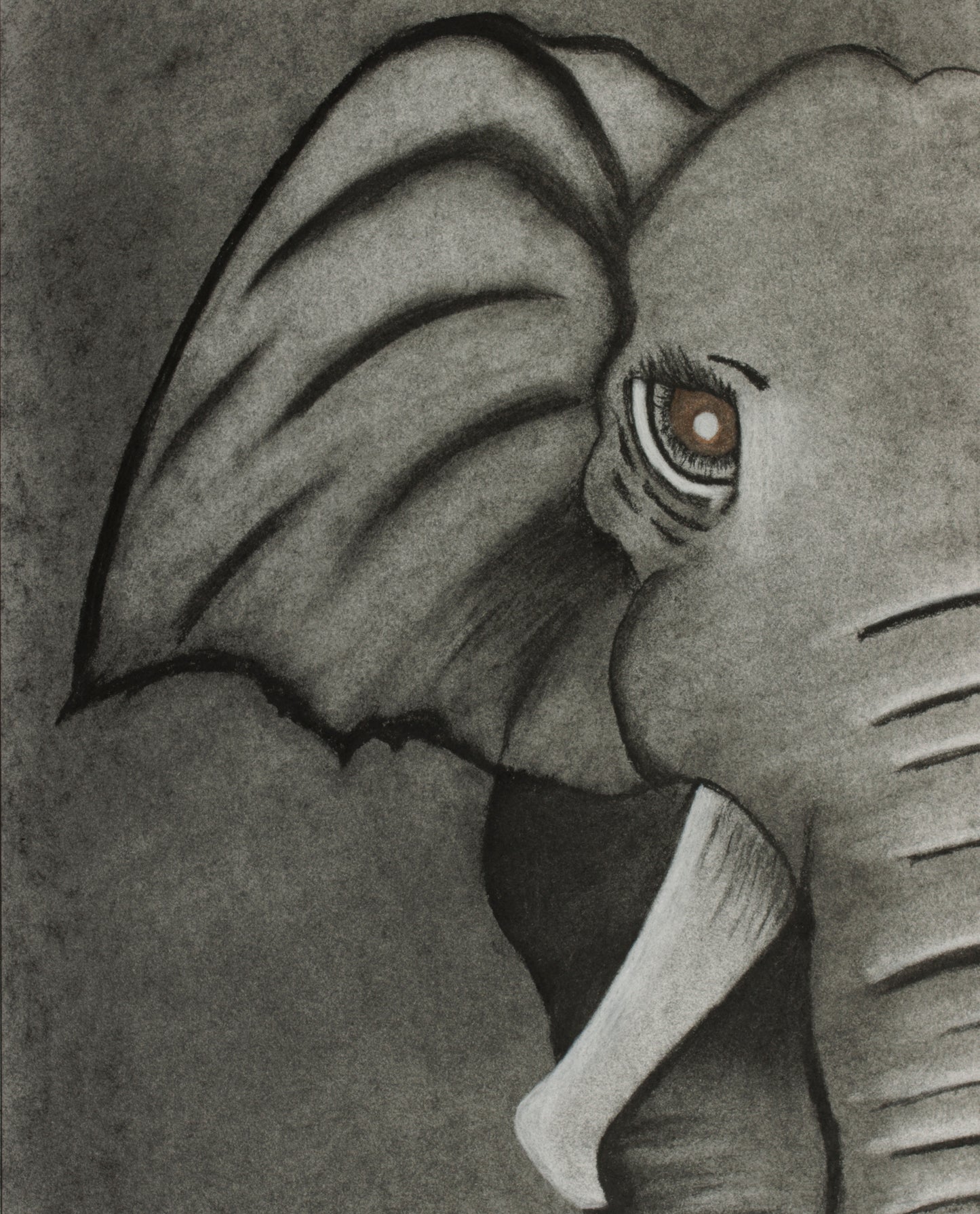 A jigsaw puzzle piece depicting a detailed monochrome elephant.